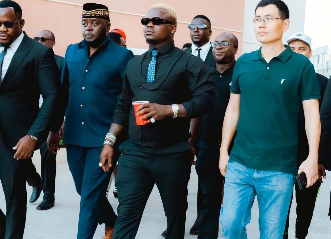 Harmonize-and-his-entourage-JXlEeVY7