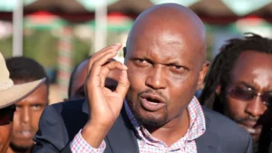 Moses Kuria gestures during a past media presser 