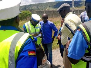 Traffic police officers and a team from NTSA during a road check along the Nairobi-Mombasa Highway on Wednesday, March 27, 2024 PHOTO NTSA