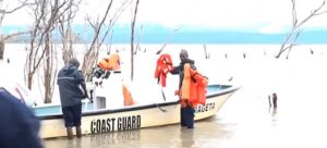 Coast guard officers inspecting their boat during a past event