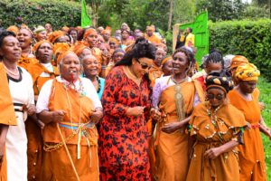 Agnes Kagure interacting with a group of elders during a past event