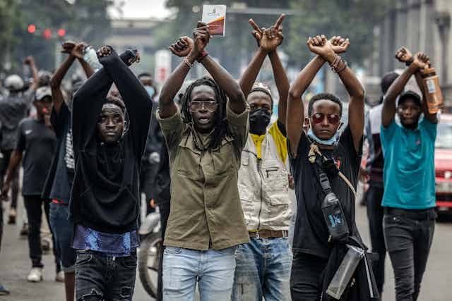 A group of Gen Z protesters matching along streets of Nairobi