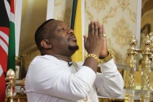 Sonko prays during a past church event