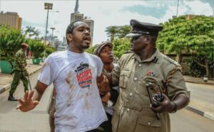 Activist Boniface Mwangi being arrested by police during a past altercation 