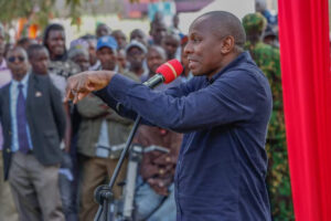 Kimani Ichungwa gestures during a past event 