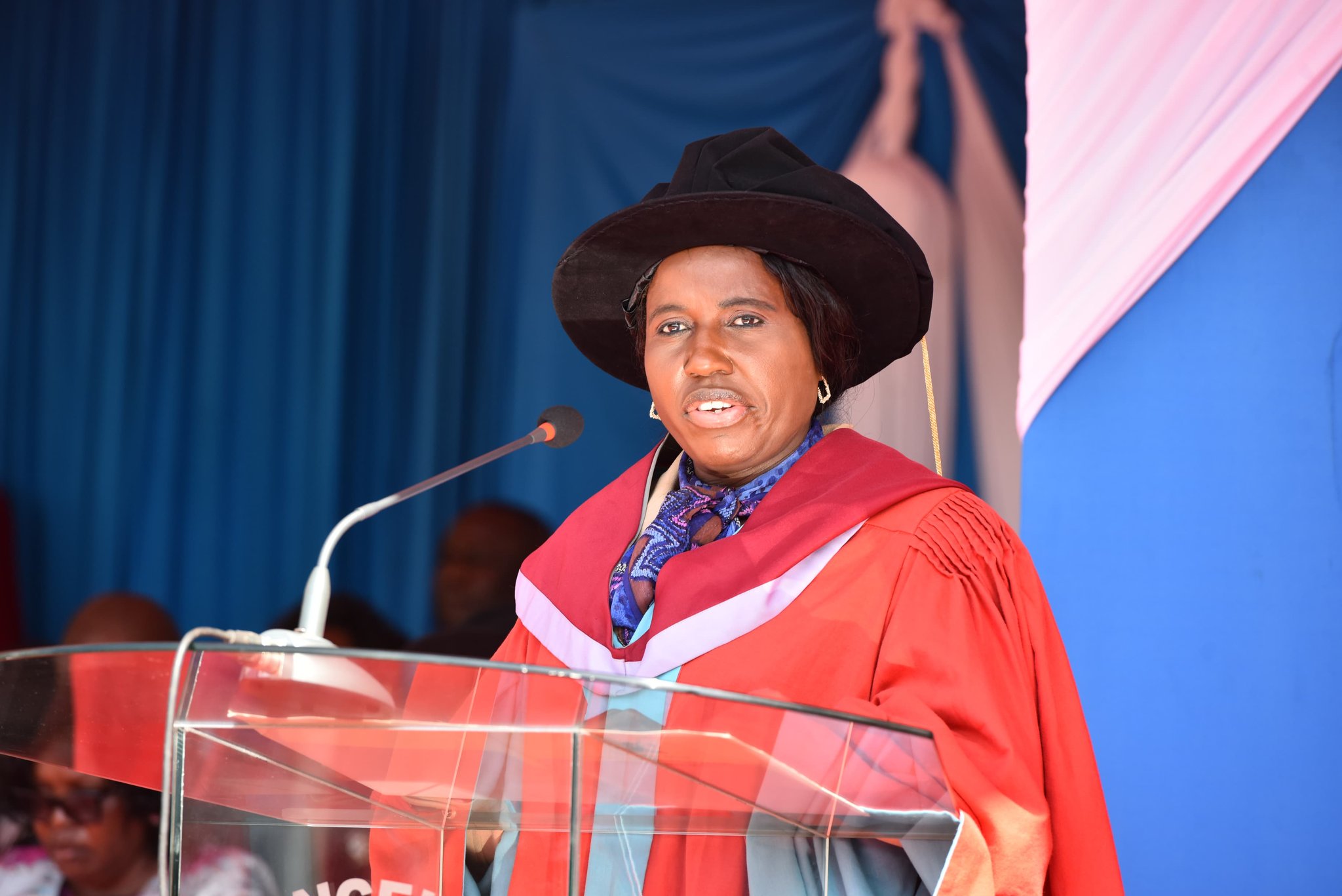 Education PS presiding over a past academic graduation ceremony 