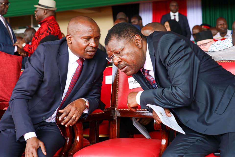 Kithure Kindiki chats with Moses Wetangula during Mashujaa Day celebrations event in Kwale County on October 20, 2024. Photo: kithure Kindiki Source: Facebook